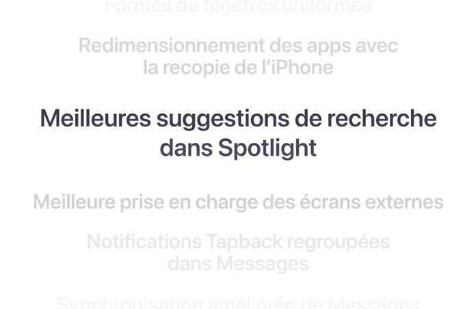 Liste verticale de fonctionnalités, avec « Meilleures suggestions de recherche Spotlight » affichées en gras au centre. Les fonctionnalités environnantes s’estompent en arrière-plan en haut et en bas.