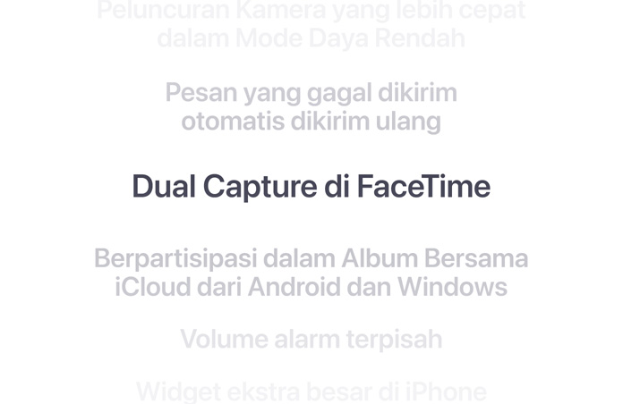 Daftar fitur vertikal, dengan “Dual Capture di FaceTime” ditampilkan tebal di tengah. Fitur-fitur sekitarnya memudar menjadi latar belakang di atas dan di bawah.