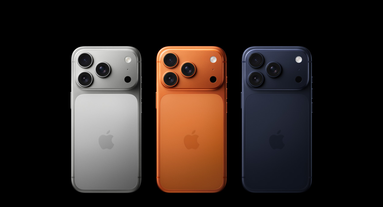iPhone 17 Pro, back exterior, all three finishes, Silver, Cosmic Orange, Deep Blue, Pro Fusion camera system in top left corner, 3 lenses, microphone, flash, Apple logo in center