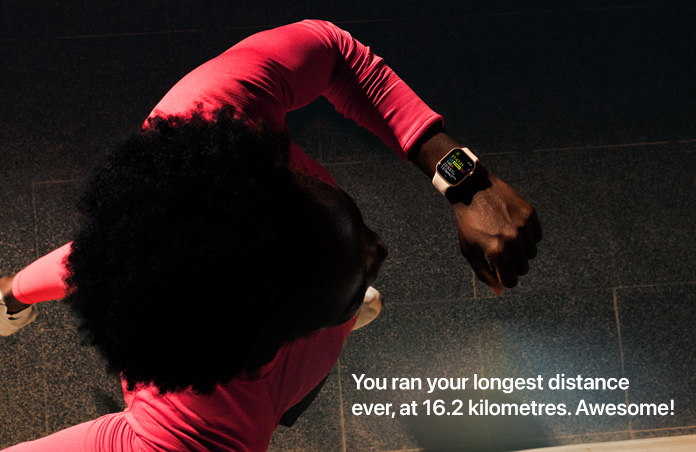Photo of a man using his Apple&nbsp;Watch to track his run