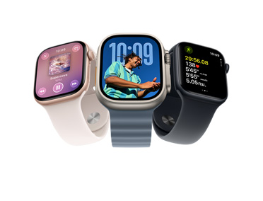 Three Apple Watch devices: Apple Watch Series 11, rose gold color, aluminum case, Apple Music, playlist controls, right side exterior, Digital Crown, light blush color Sport Band, silver pin-and-tuck closure, Apple Watch Ultra 3, natural color, titanium case, edge-to-edge display, photo overlaid on time, right side exterior, Digital Crown, anchor blue color Ocean Band, tubular fluoroelastomer rubber, Apple Watch SE 3, aluminum case, midnight color, right side exterior, Digital Crown, advanced Outdoor Run workout metrics