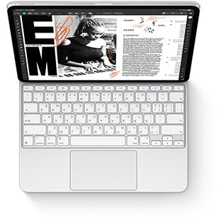 iPad Pro 搭配適用於 iPad Pro 的白色巧控鍵盤的俯視圖。