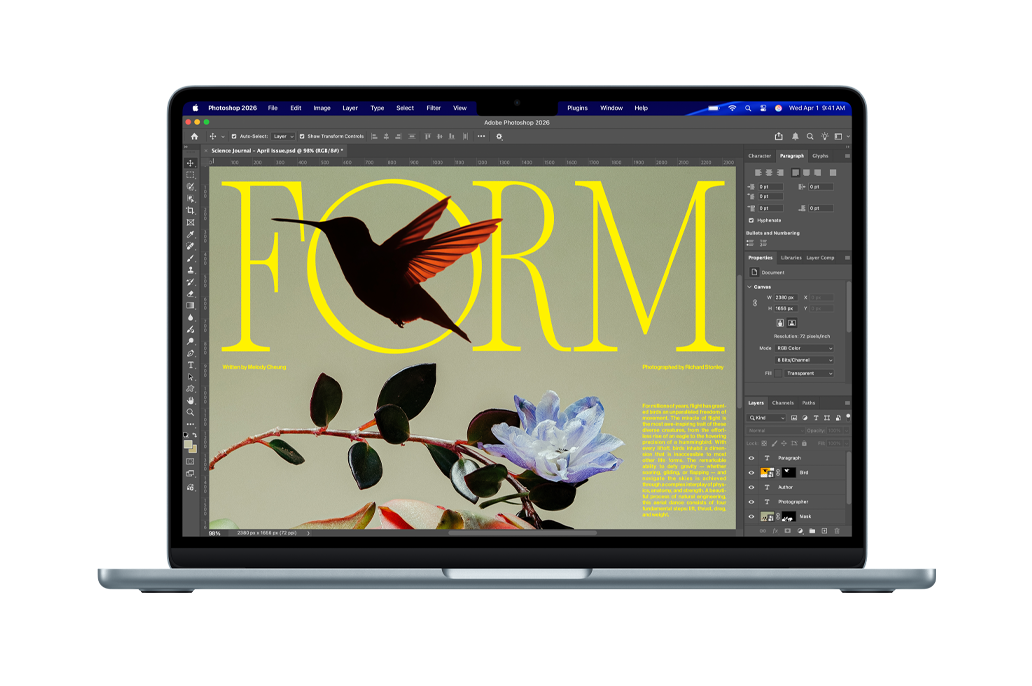 A science journal cover design is being created in Adobe Photoshop on a MacBook Air screen