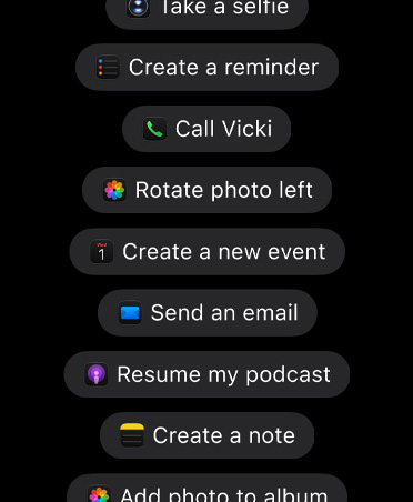 Screen with requests for Siri AI to take action in apps, including Take a selfie, Create a reminder, Call Vicki, Rotate photo left, Create a new event, Send an email, Resume my podcast, Create a note, Add photo to album