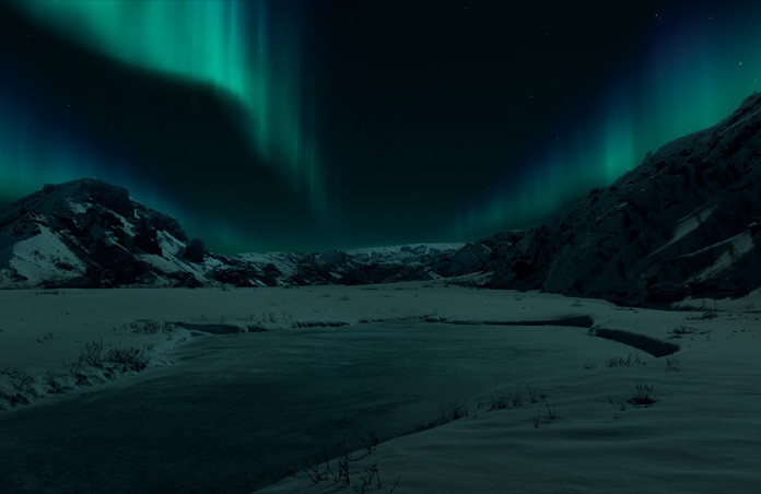 Apple Vision Pro view of an Icelandic Environment, snowy mountains and the Northern Lights sit against a dark background